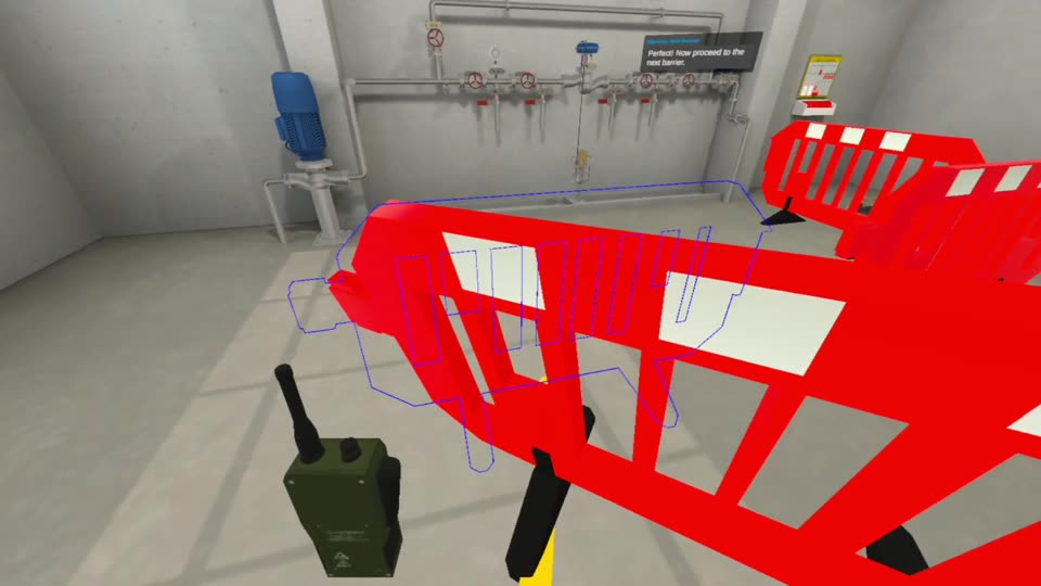 A red barrier being placed in front of the pipework
