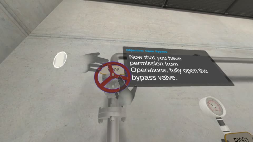 A hand on a valve handwheel beside an instruction panel