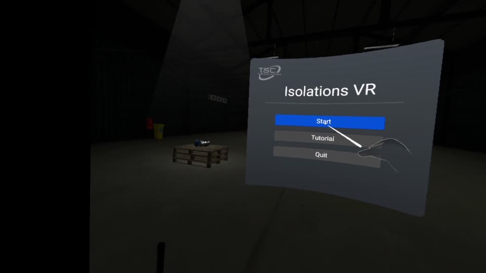 A hand pressing Start on the Isolations VR menu in the warehouse