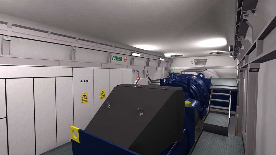 The interior of a wind turbine nacelle with the generator and cabinets